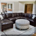 F01. Leather sectional. 32"h x 131"w x 101"d (left side 64"d) 